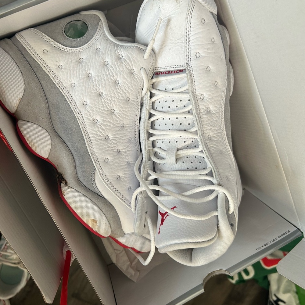 White and Red Athletic Shoes